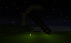 Gold Pickaxe Torches Night.jpg